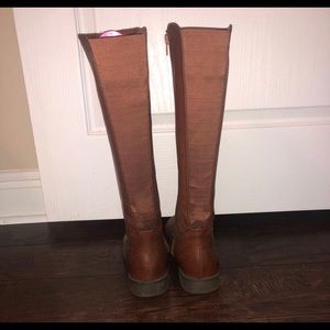 Brown riding boots